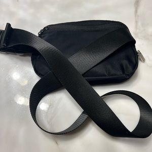 Lululemon black belt bag in excellent condition gently used